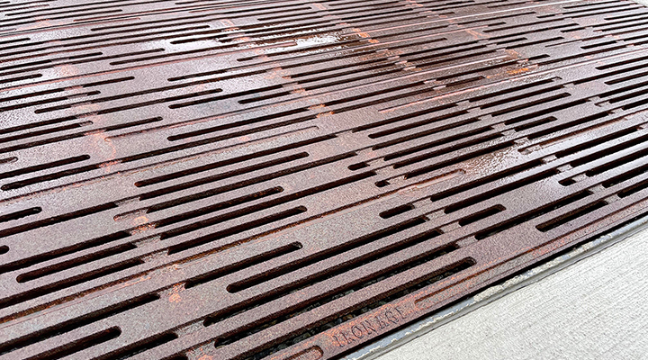 Cast iron grates in decorative Rain pattern by Iron Age Designs.