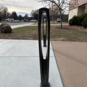 Decorative cast iron bollard with black powder coat finish in the "Needle" pattern from Iron Age Designs