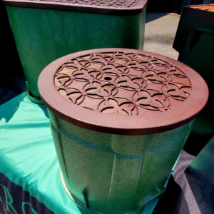 Cast iron access covers with decorative Quatrefoil pattern from Iron Age Designs.